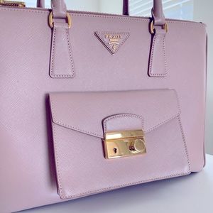Beautiful Prada purse mint condition in blush color with gold hardware.